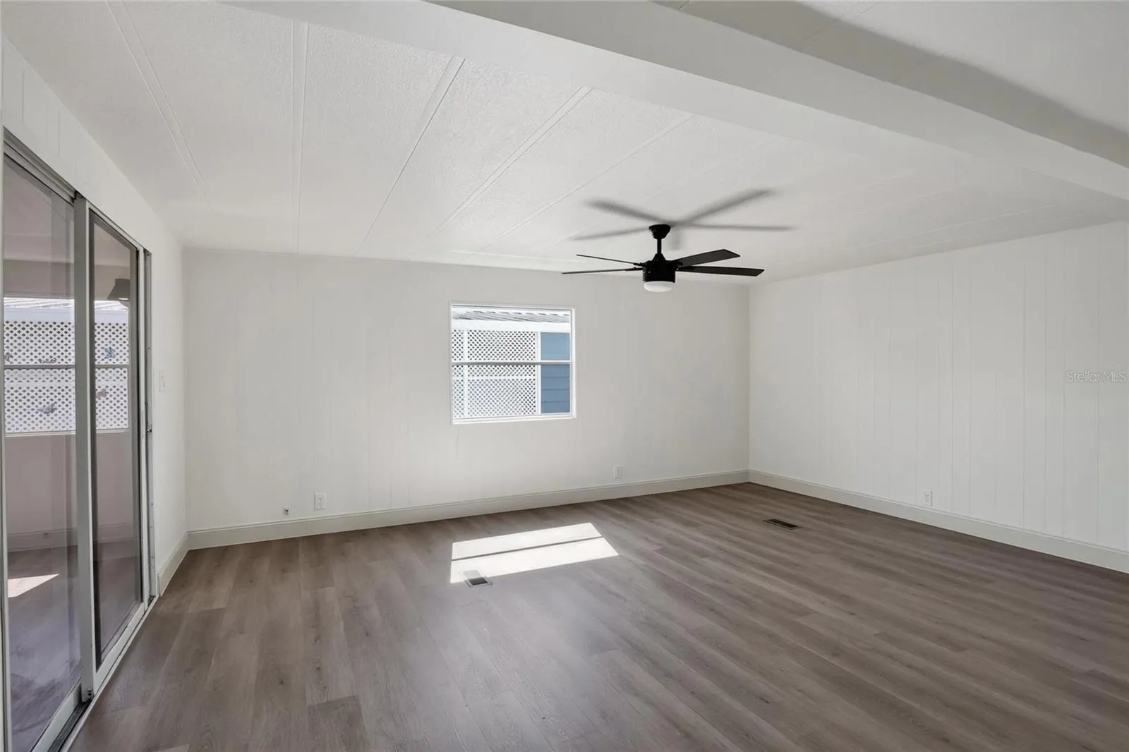 Living Room, with sliding door to Florida Room