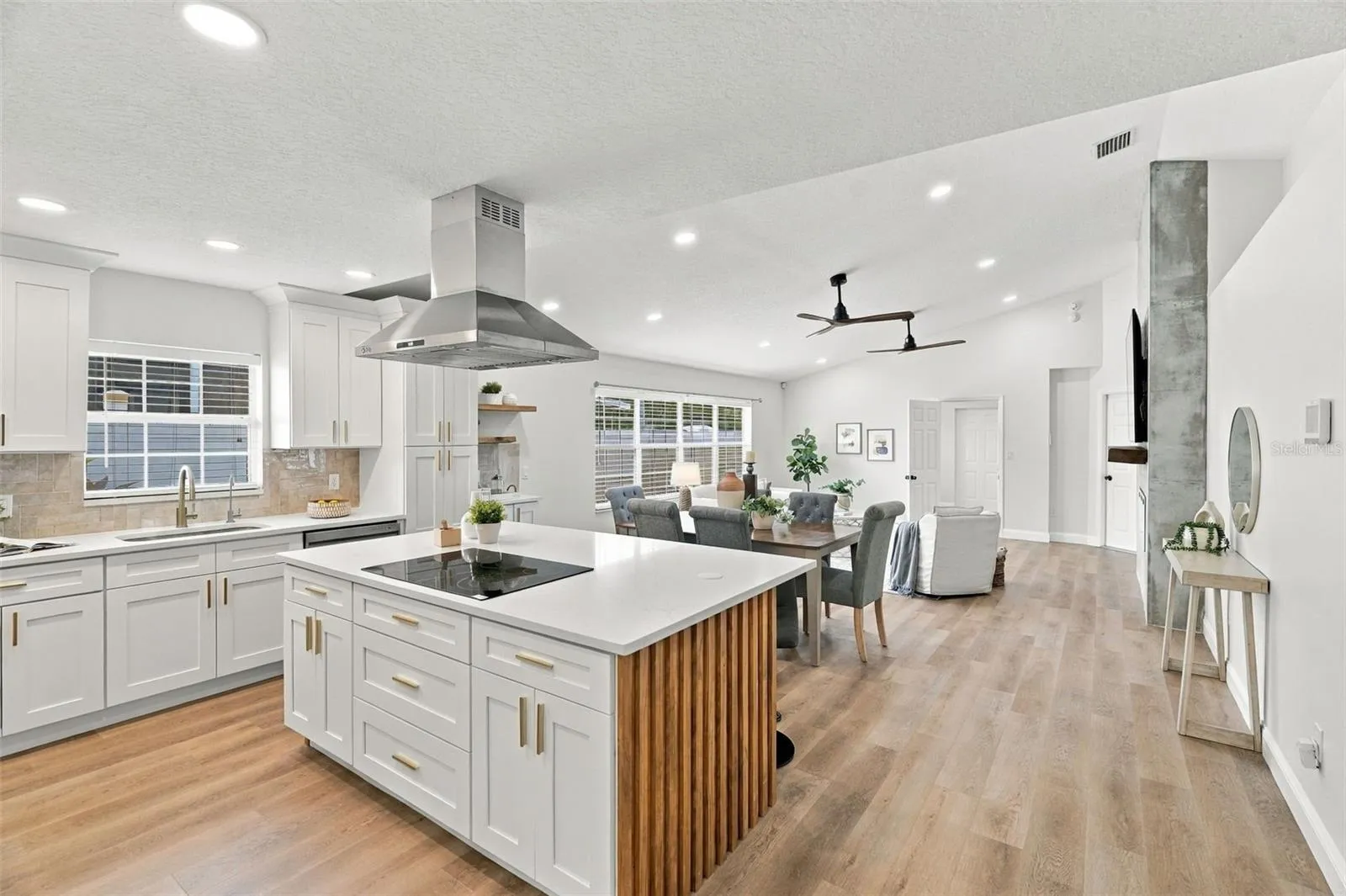 Vaulted ceilings and an open floor plan create an impressive sense of space.