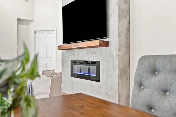 An electric fireplace creates a striking focal point.