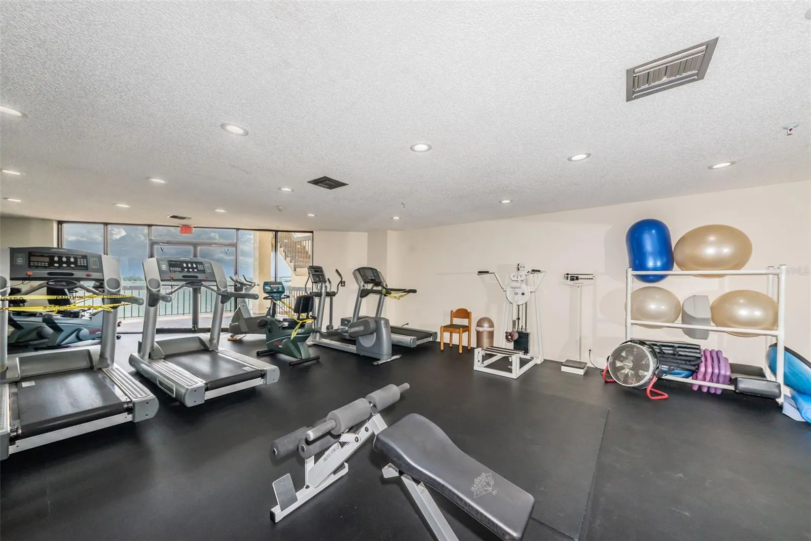 Private gym offers open water views.