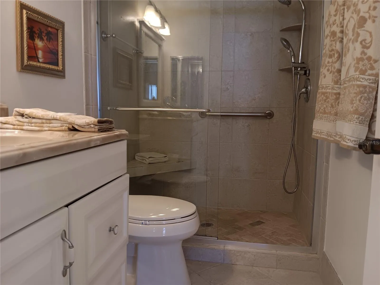 Primary bath offers walk in shower.