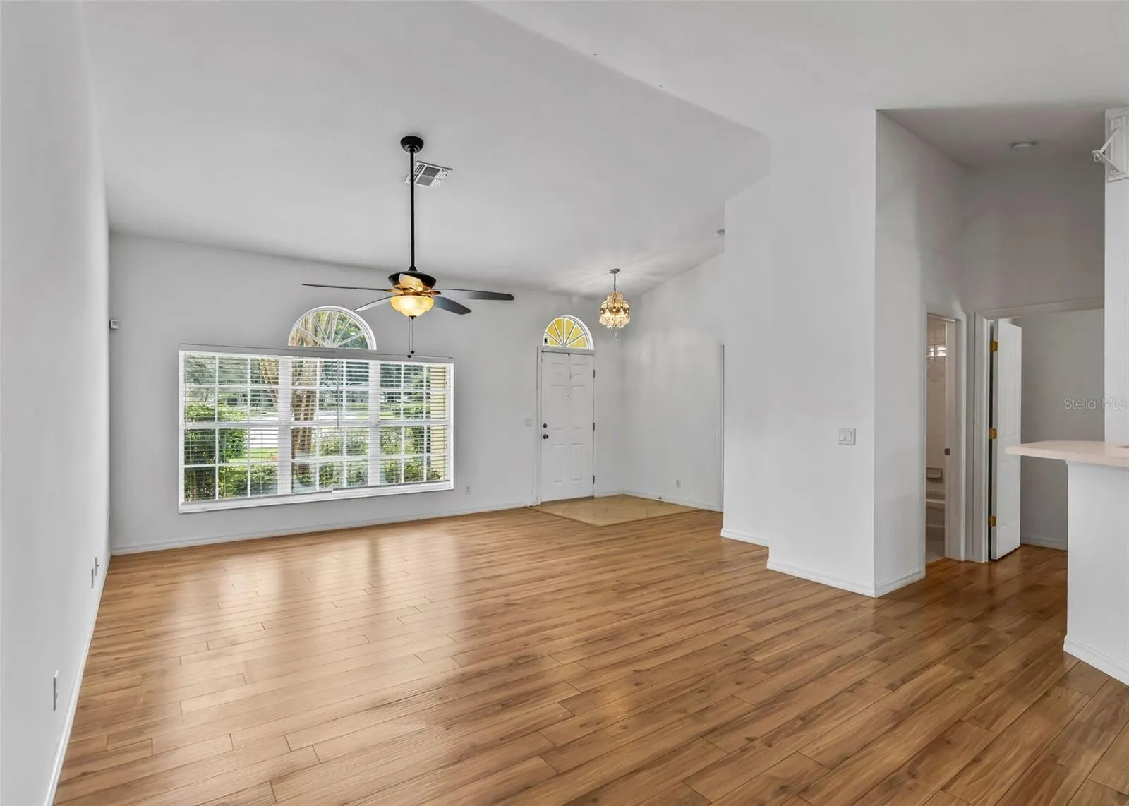 Front windows let in the light and the fan window at the top adds interest
