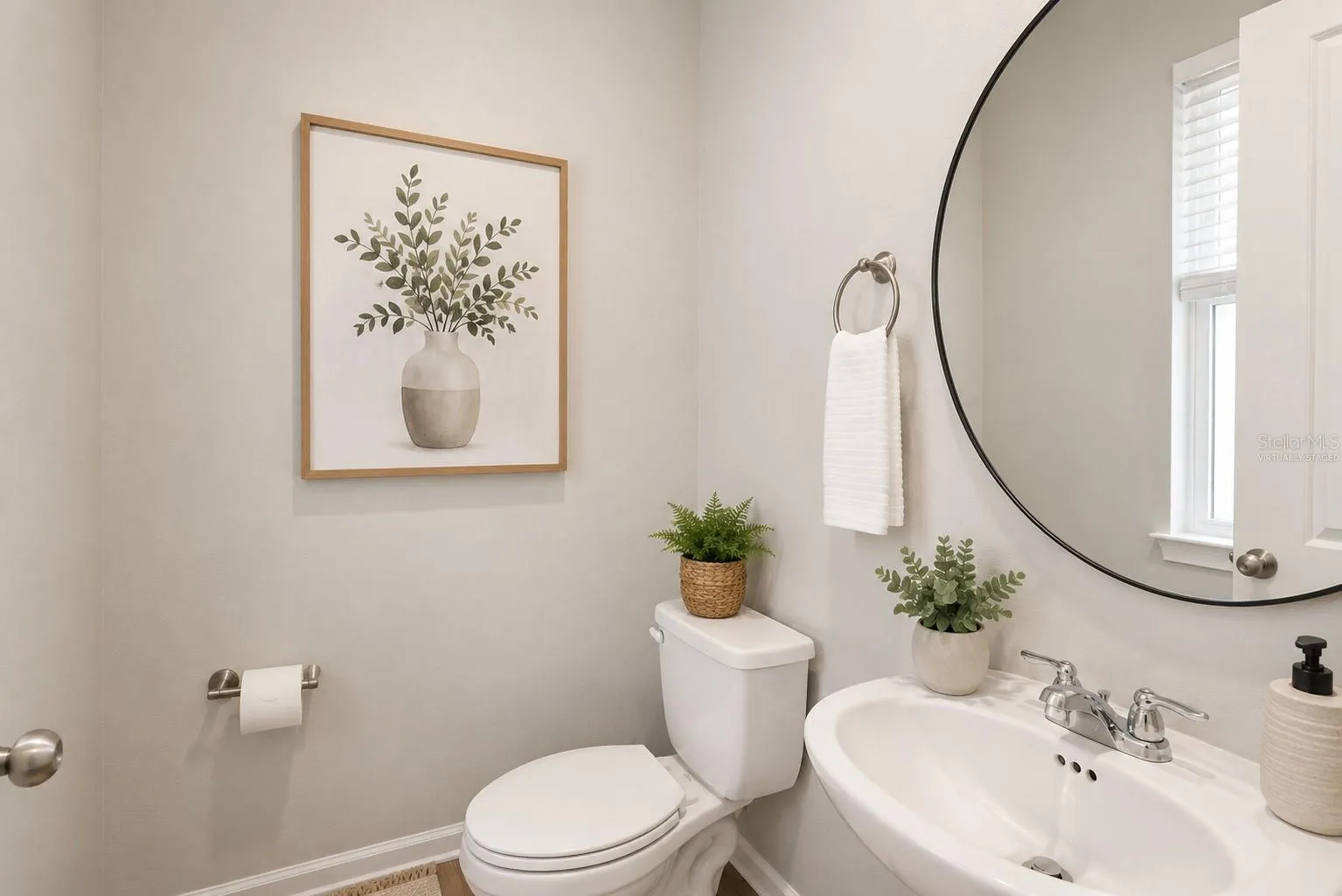 1/2 BATH BY THE ENTRY, FIRST DOOR TO THE LEFTvirtually staged