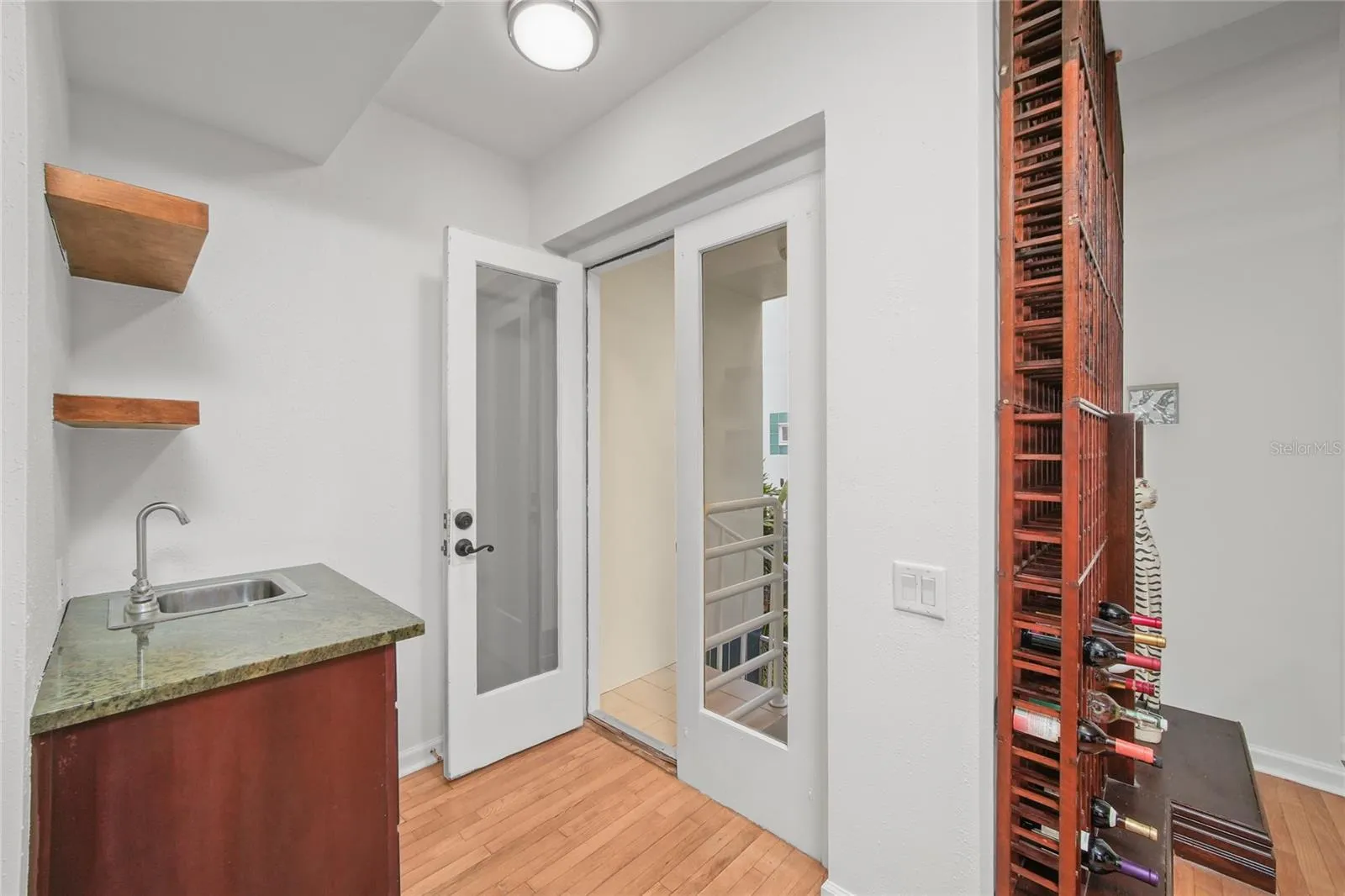 Access to private under building garage via spiral staircase just outside