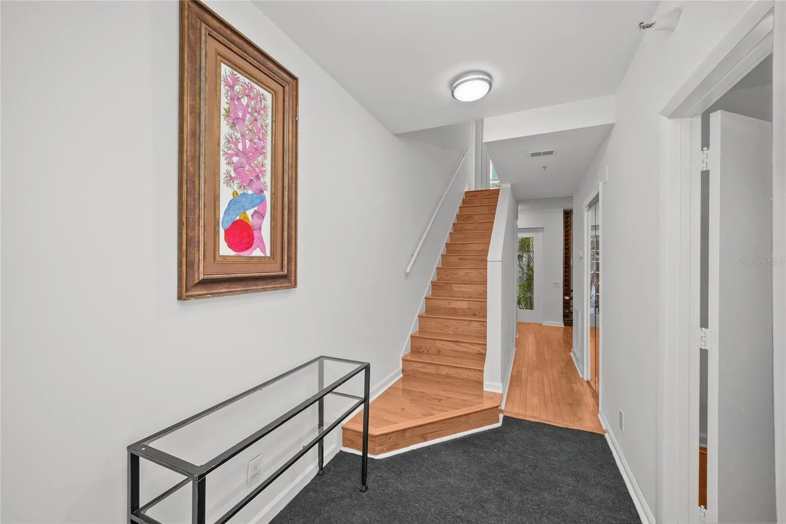 Foyer and stairs to 2nd floor