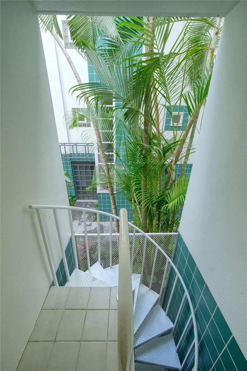 Access to private under building garage via spiral staircase just outside