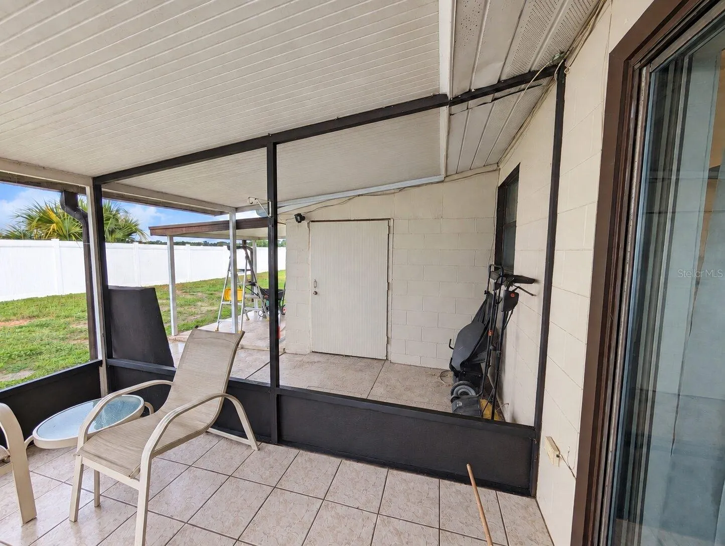 Attached storage and covered open patio