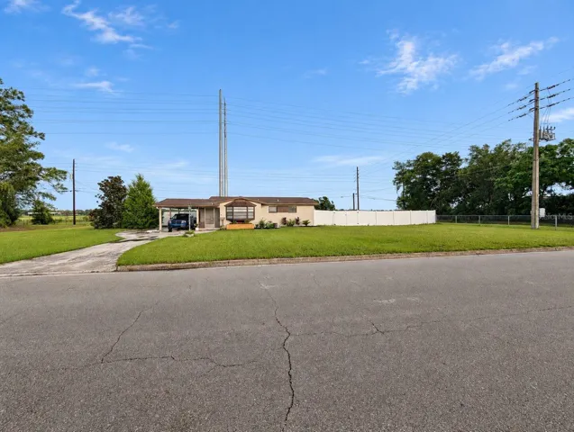 Buffer on BOTH sides and no rear neighbor! 0.57 acre lot!