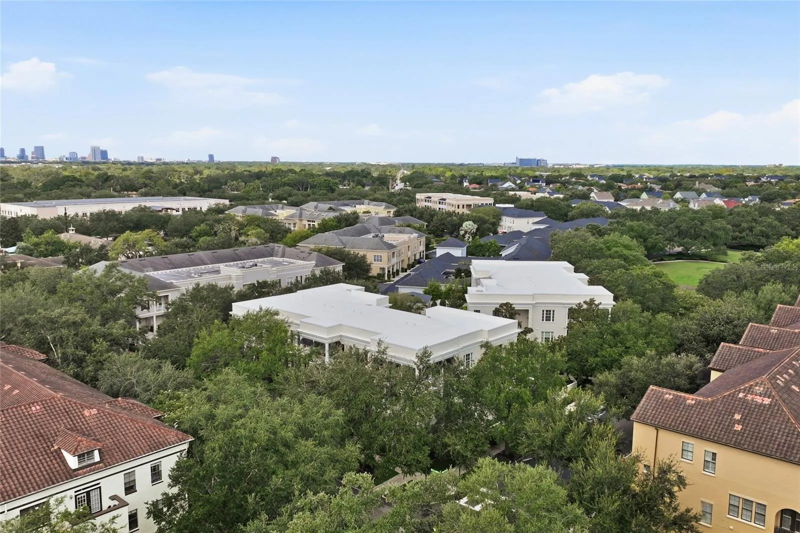 Aerial view showcasing Baldwin Park’s beautiful tree-lined neighborhood and proximity to Downtown Orlando.