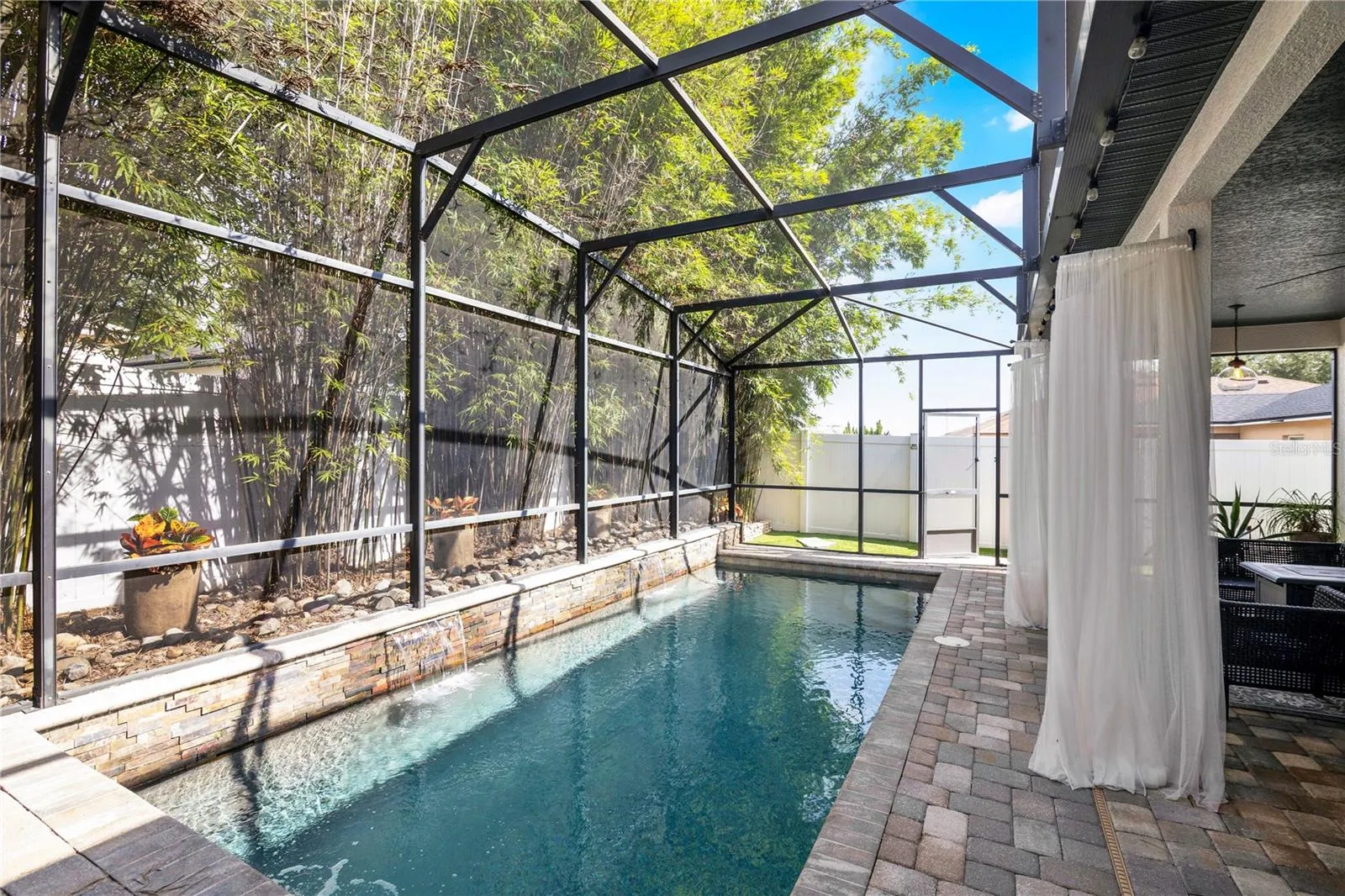 Private screen-enclosed pool area
