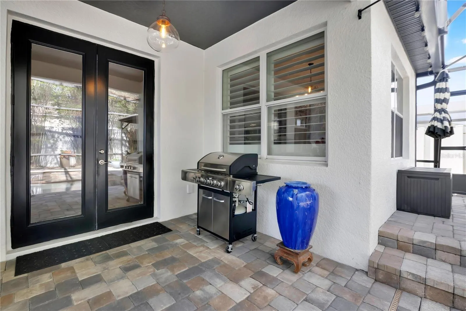 Entry into home from Screen-enclosed Pool Area