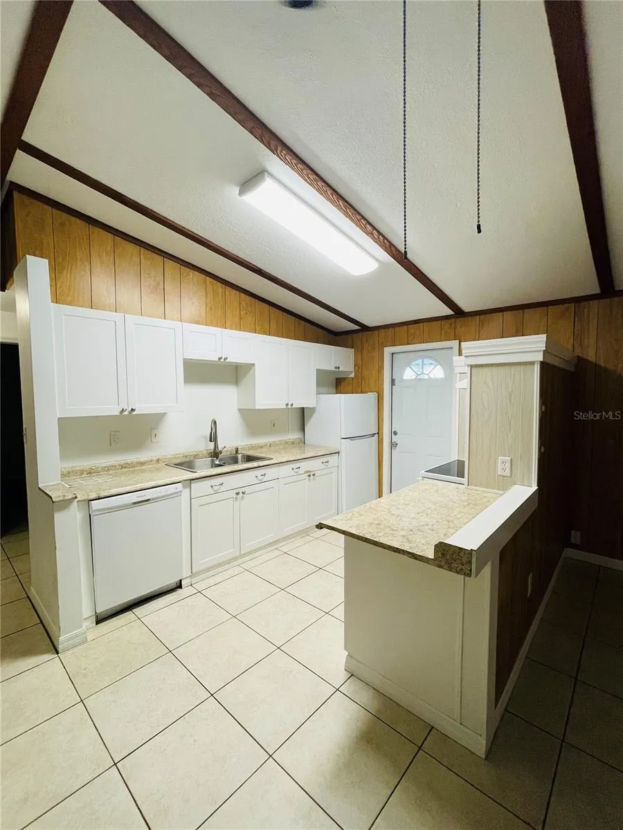 View to kitchen from Living area.