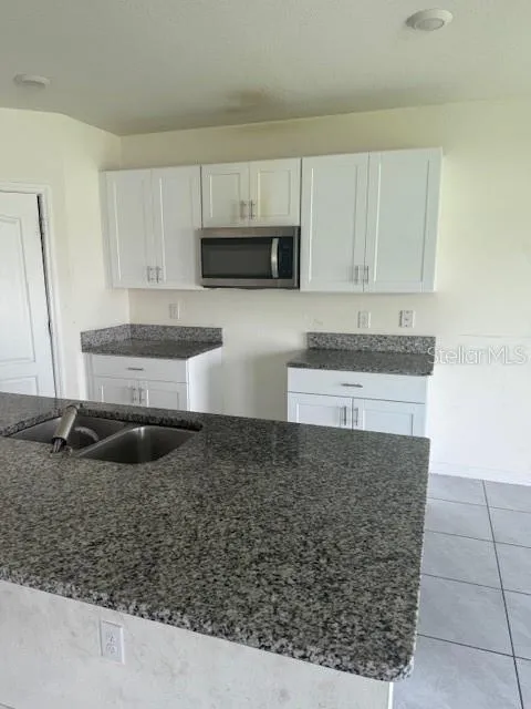Granite Countertops and Beautiful Kitchen Cabinets!