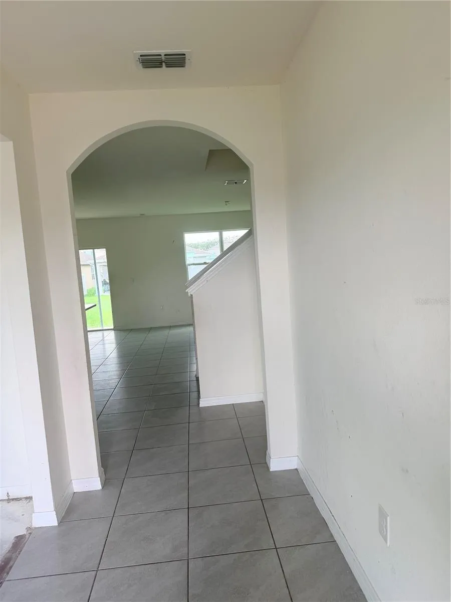 Tile Flooring in hallway and Family Room