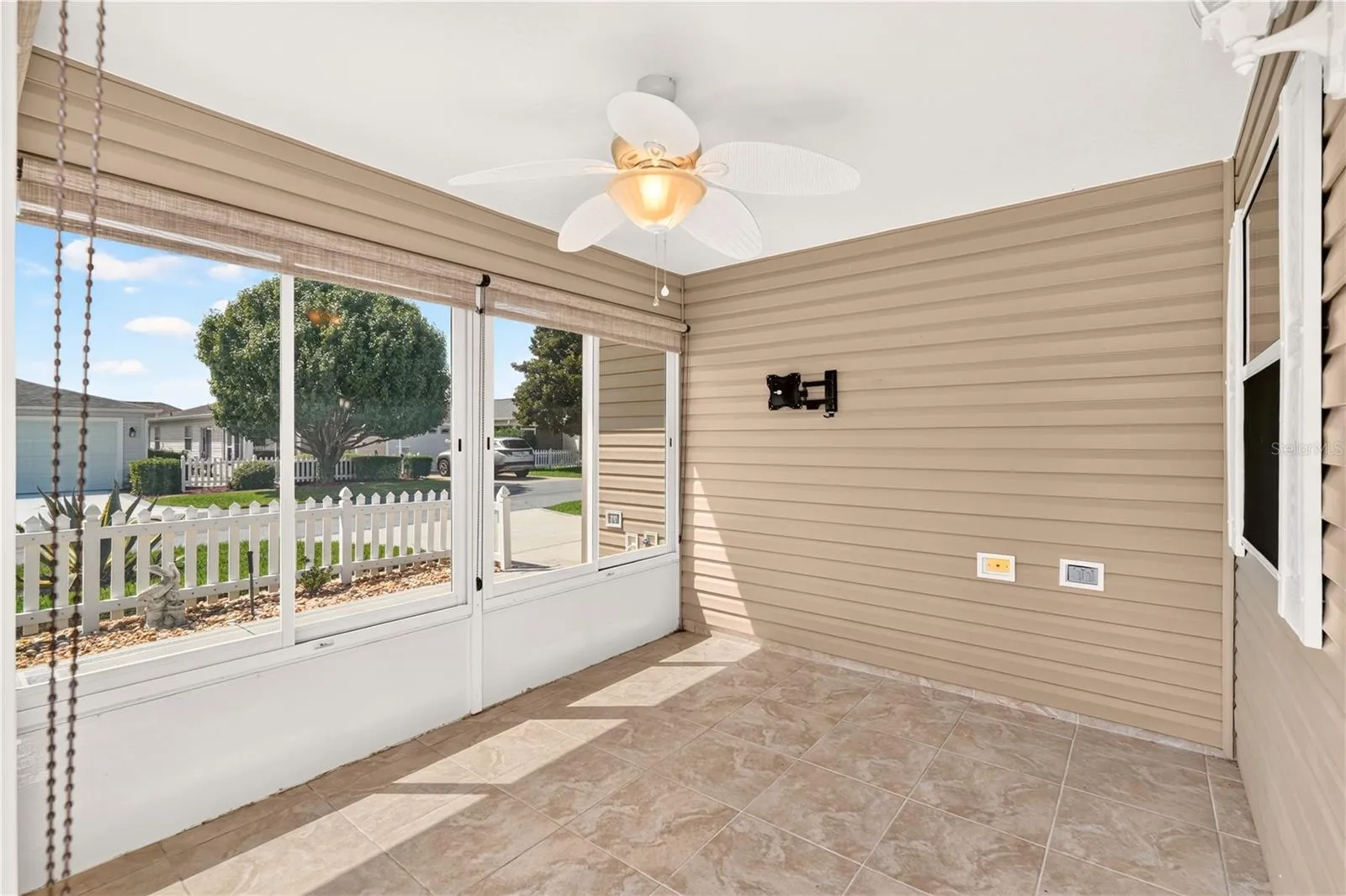 The front lanai is a sweet spot to watch TV, read a book, have your morning coffee...