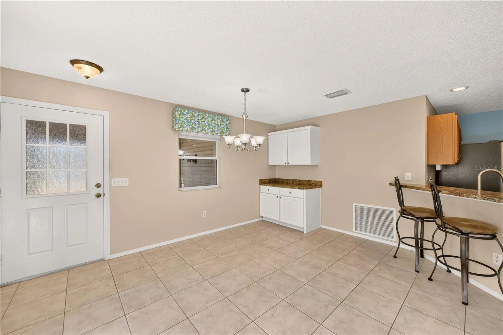 The custom cabinetry in the dining room adds welcomed storage.