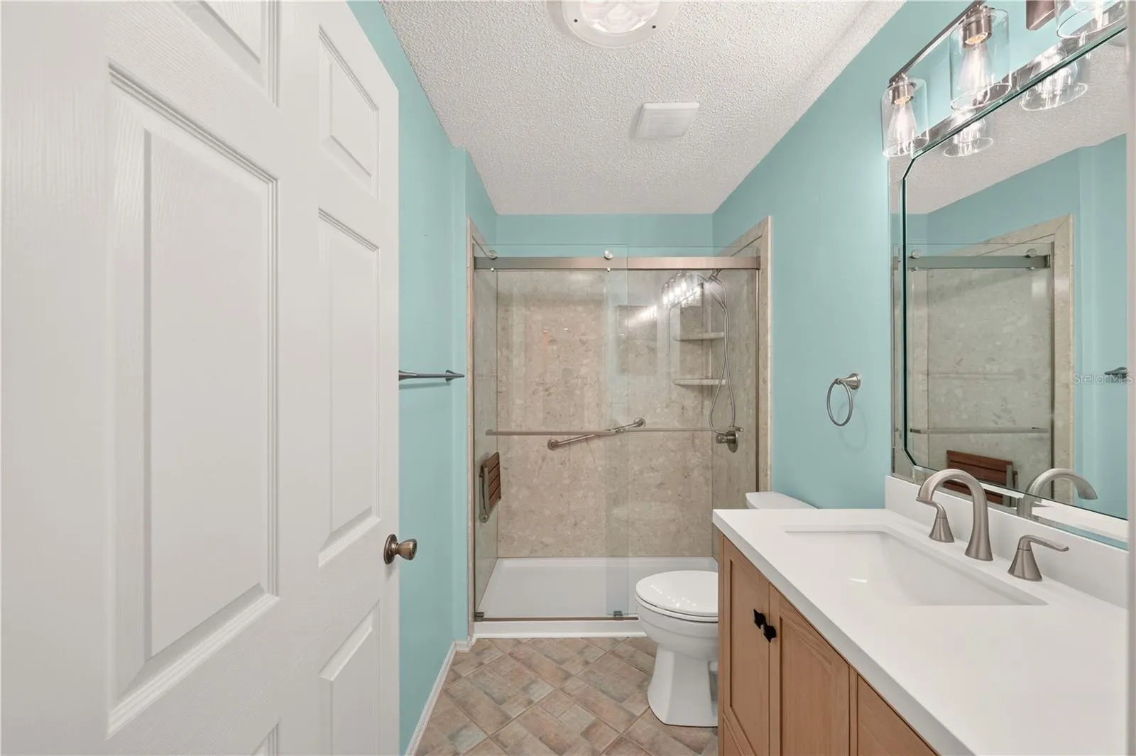 You will LOVE the incredibly updated guest bathroom.