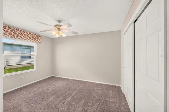 The guest bedroom has a large closet.