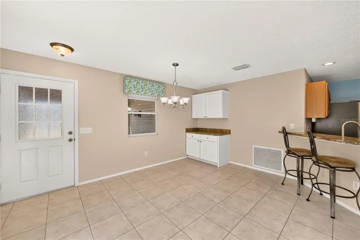 The custom cabinetry in the dining room adds welcomed storage.