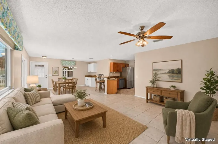 VIRTUALLY STAGED... Look how cozy your villa will look with your furniture.