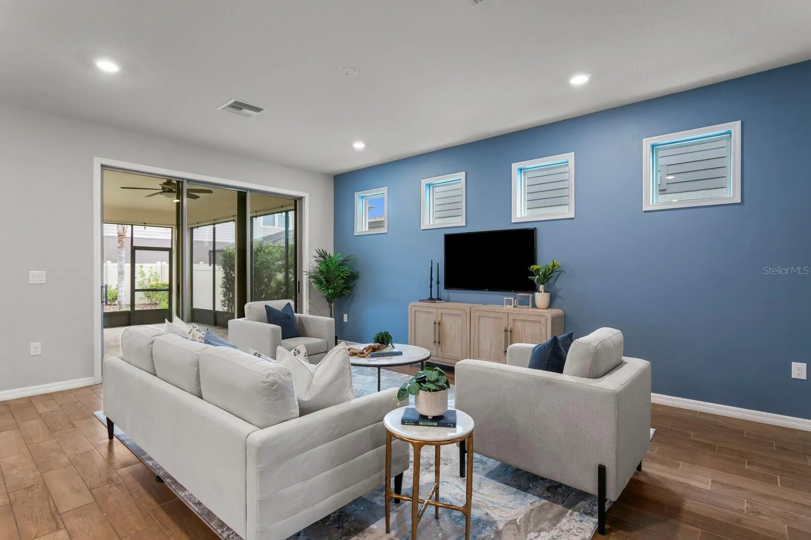 Triple sliding glass doors out to lanai