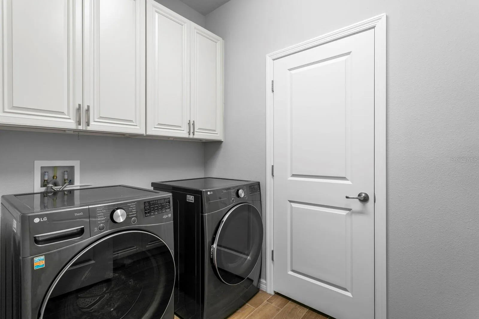 Upscale laundry room with washer/dryer included