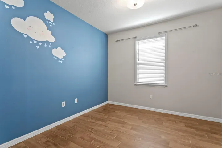 1st floor private home office/den/gym or easily converts to 4th bedroom if desired