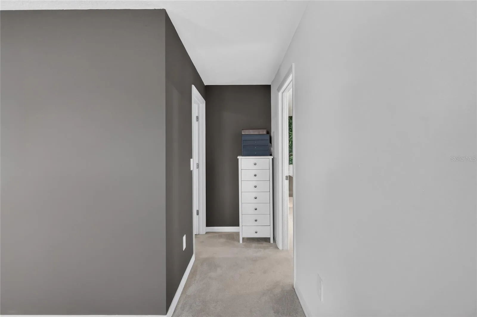 Hallway to primary bathroom