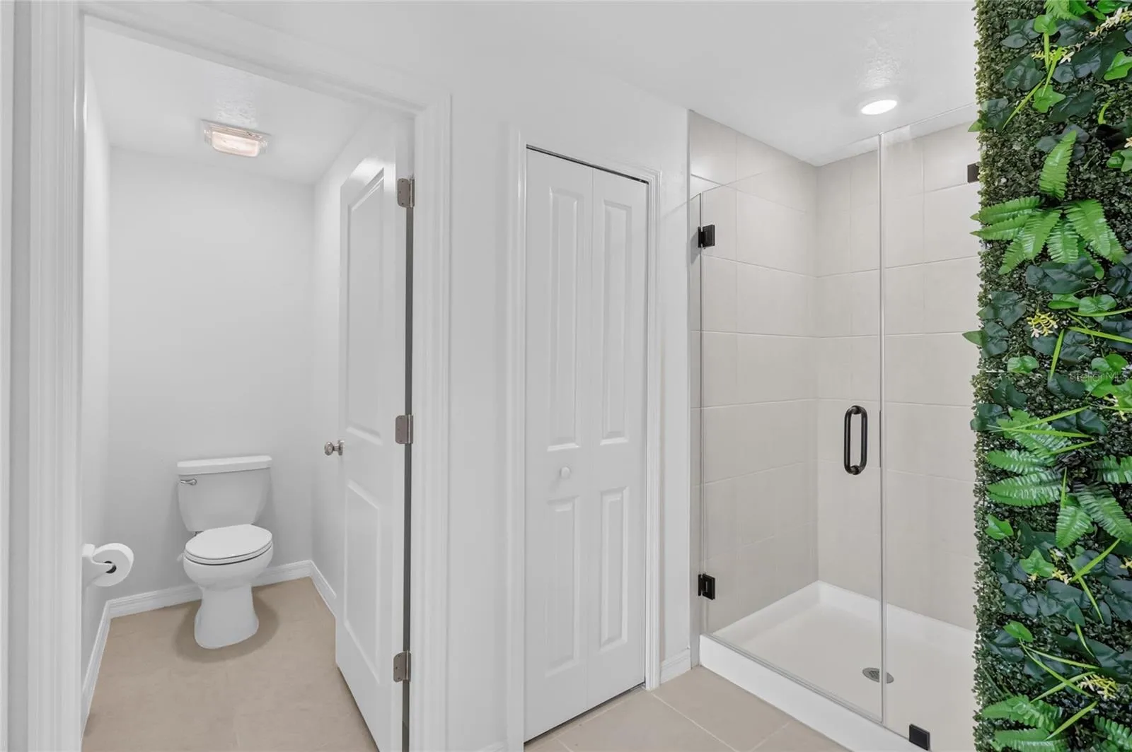 Walk-in shower and water closet