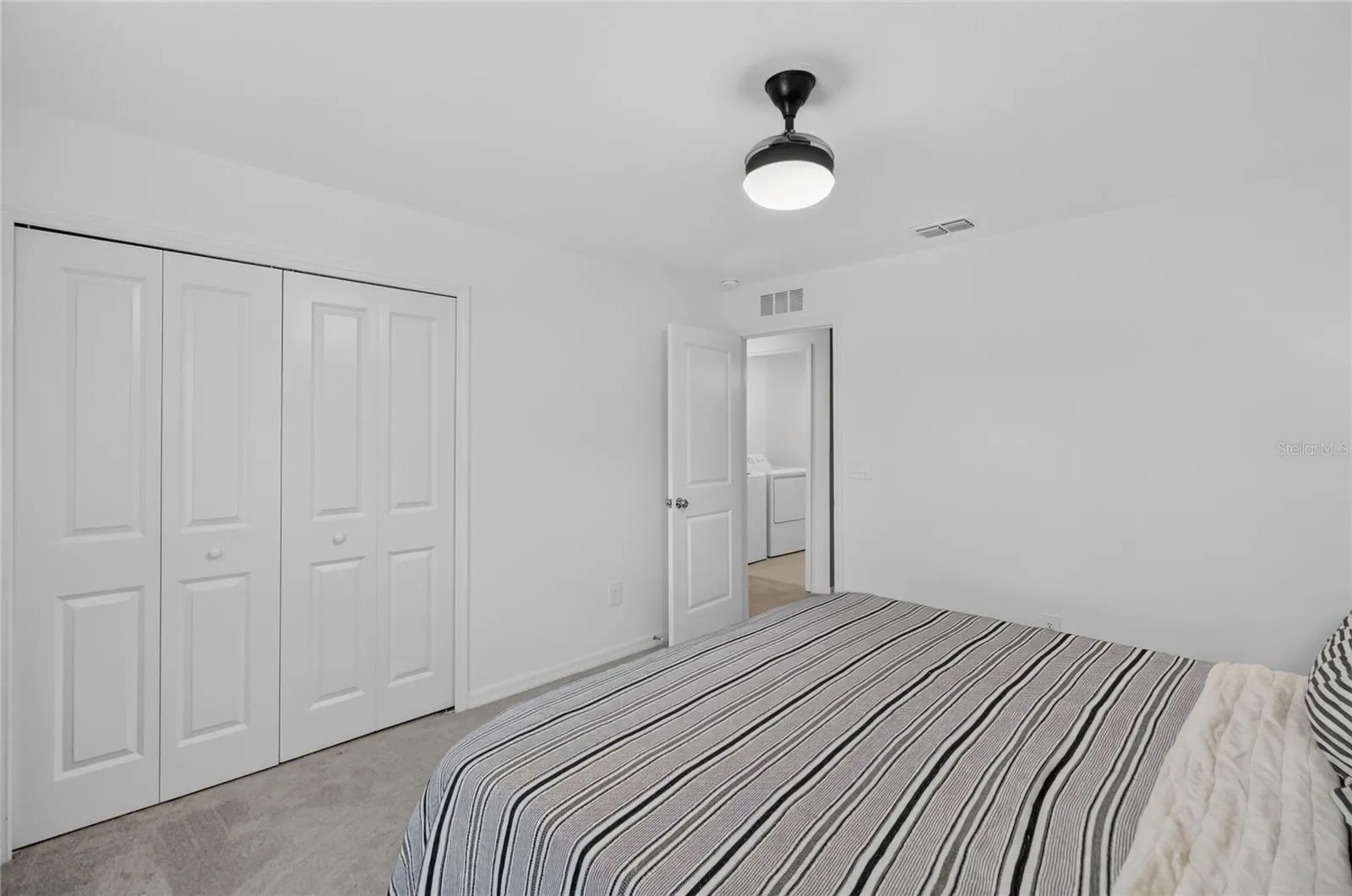 Built in closet and updated light/fan fixture
