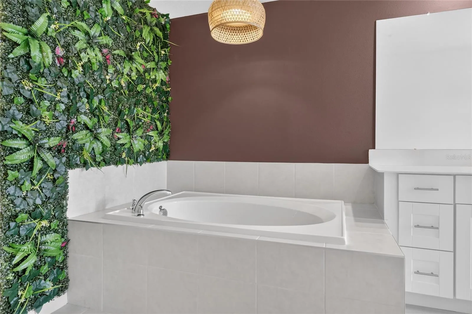 Soaking tub with updated lighting fixture