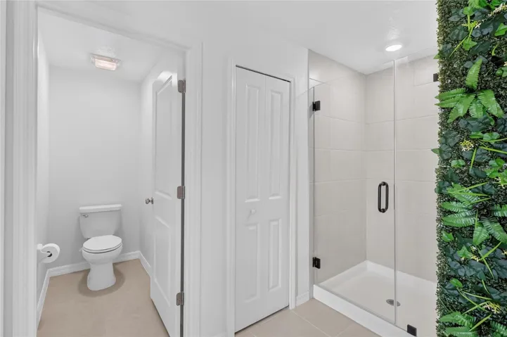 Walk-in shower and water closet