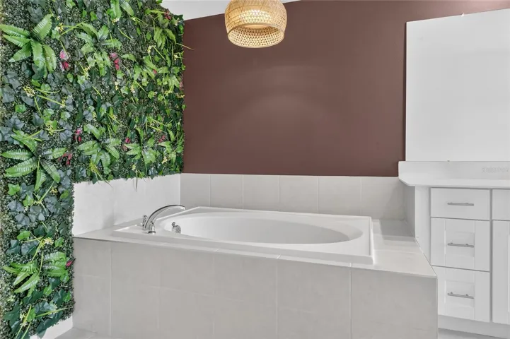 Soaking tub with updated lighting fixture