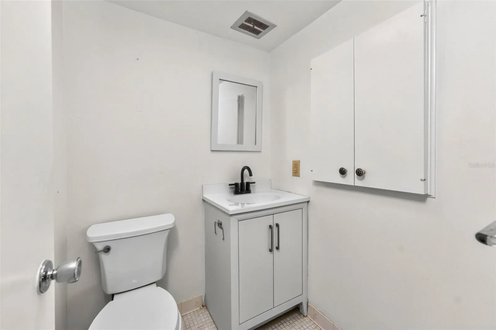 Secondary bathroom with vanity