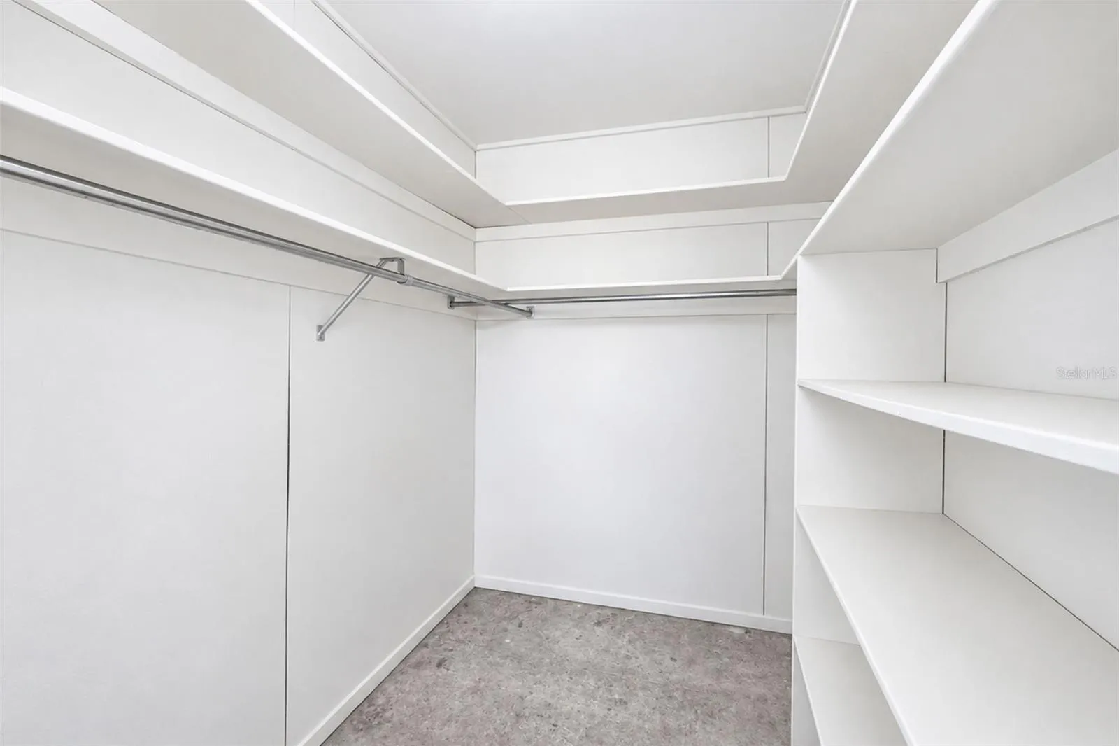 Spacious walk-in closet with built-in shelving