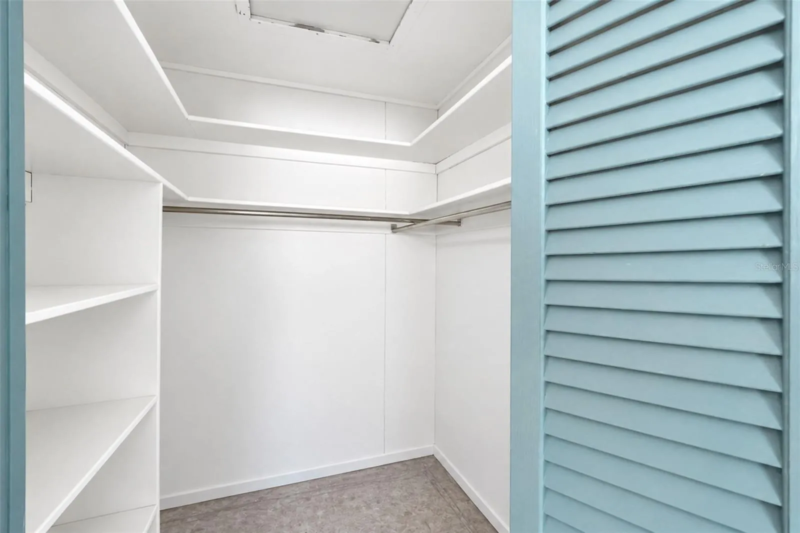 Bedroom 2 walk-in closet with shelving