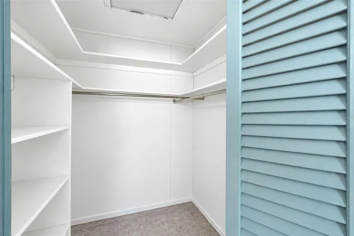 Bedroom 2 walk-in closet with shelving