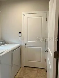 Laundry Room is adjacent to 2 Car Garage.