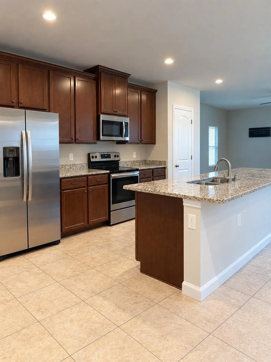 Stainless Steel Appliances and Granite Counter Tops