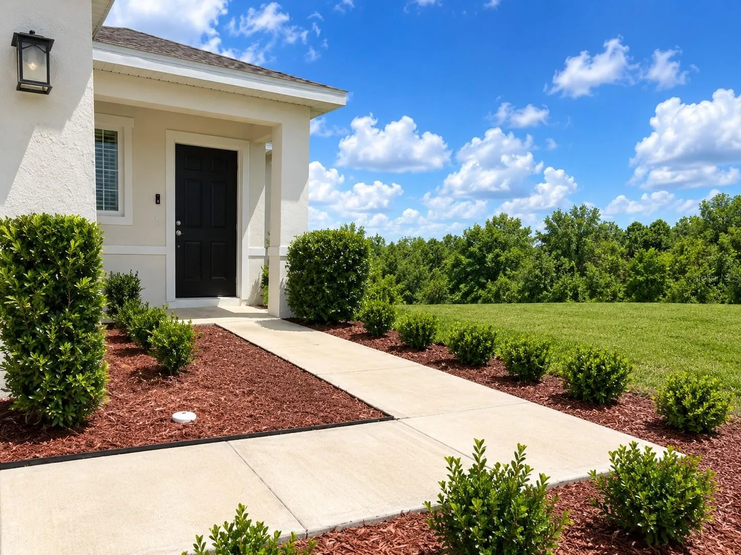 Landscaped and Remulched.