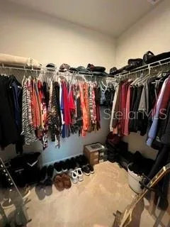Primary Closet has nice shelves.