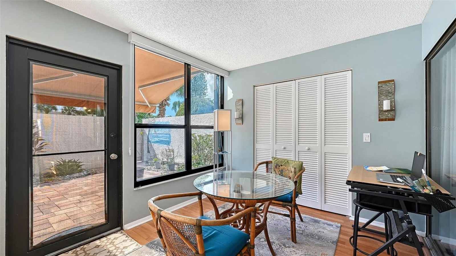A real back door means that you won't have to wrestle with heavy sliders to access the courtyard. You can also wee the retractable shade above the door that helps keep the home cool.