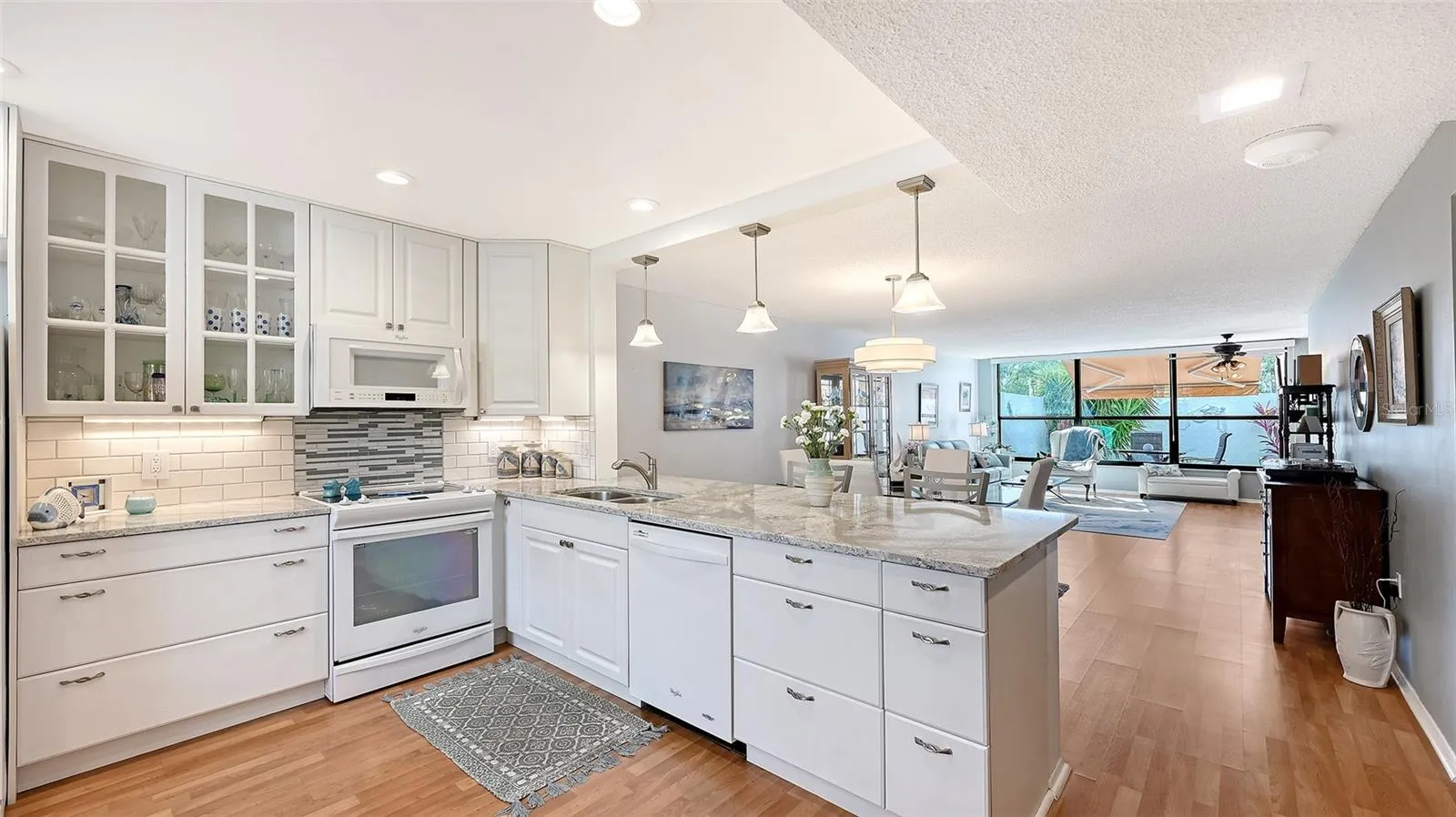 updated/open Kitchen w subay tile backplash