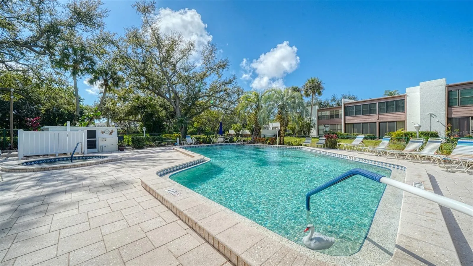 one of 7 pool/spa area in the community available for all residents in this association.