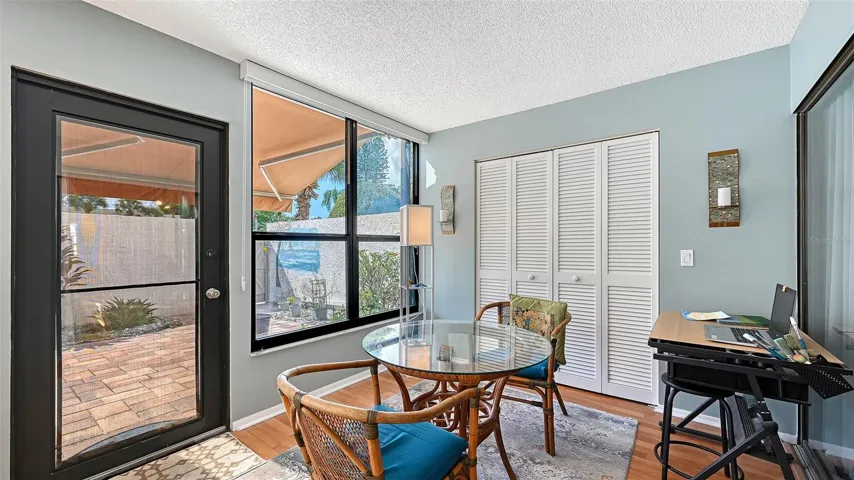A real back door means that you won't have to wrestle with heavy sliders to access the courtyard. You can also wee the retractable shade above the door that helps keep the home cool.