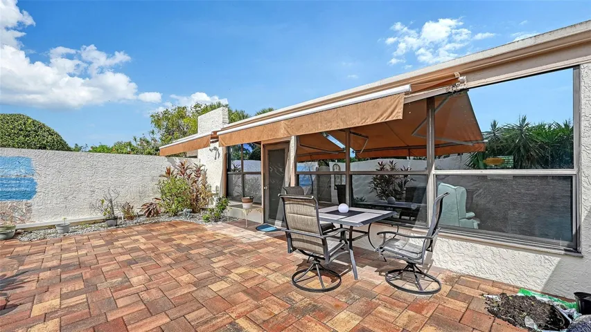 You dont have to give up your private back yard if you buy this home. The courtyard is yours landscape as you wish (larger trees may need association approval). Great for outdoor cooking. Also a huge plus if you are a dog owner- a lockable gate makes if fully enclosed and secure. The walls are 6'+ high.