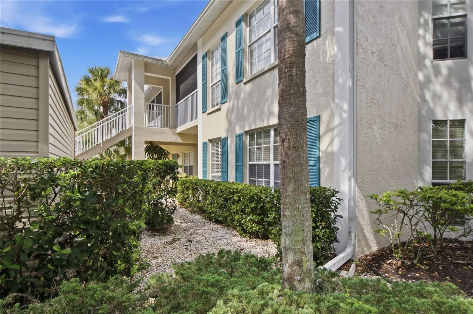 Front of condo between carport and condo