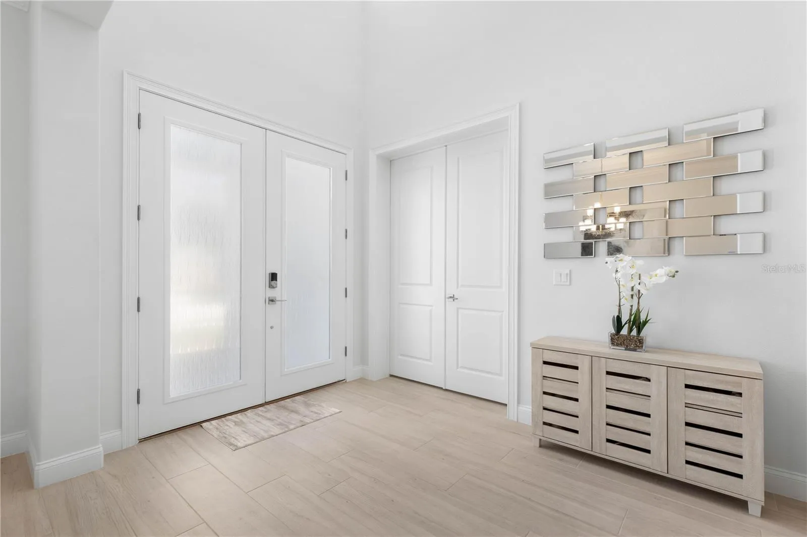 Bright open entry with two story ceiling