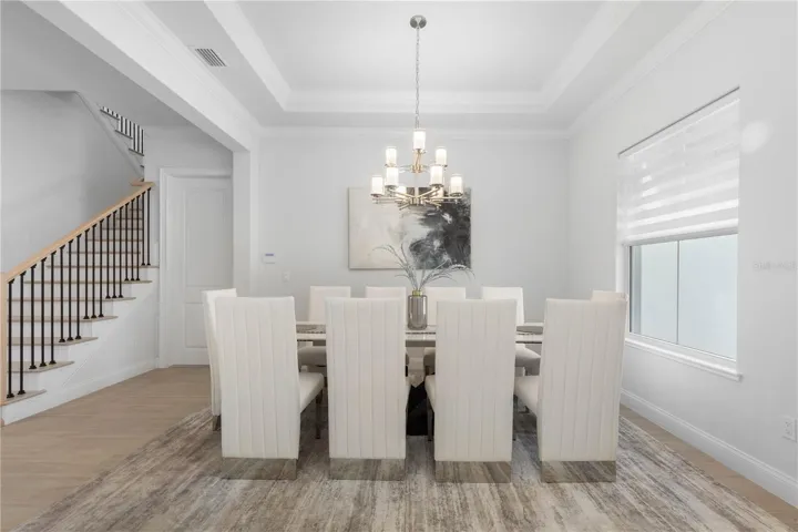 Formal dining area with room for family and friends