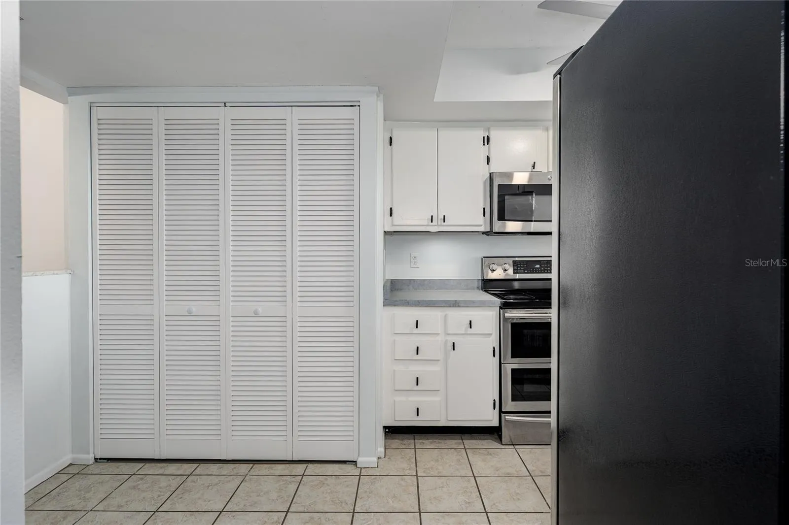 Laundry Closet - Kitchen